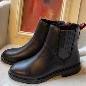 Brand New NEVER WORN Black Cougar brand womens ankle boots.  Size 7. GREAT DEAL